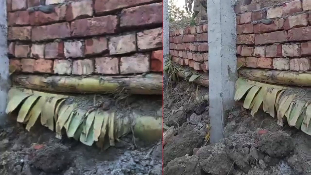 সড়কের গাইডওয়ালে কলাগাছের ওপর ইটের গাঁথুনি!