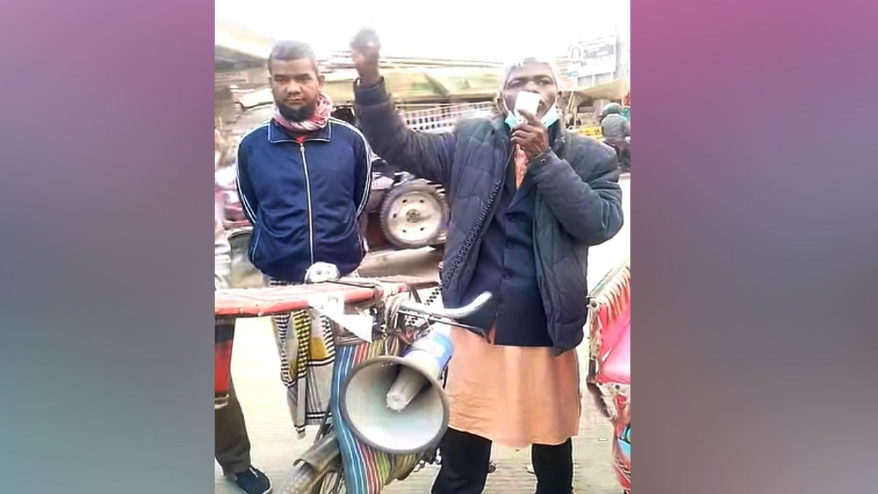 বাইসাইকেলে ঢেঁকি বেঁধে এমপি প্রার্থীর নির্বাচনি প্রচার