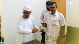 তারাগঞ্জে ৬৫ পূজামণ্ডপে চাল বিতরণ করলেন এটিএম আজহারুল ইসলাম