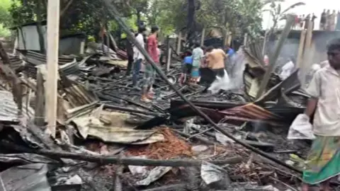 মাদকাসক্ত যুবকের আগুনে পুড়ল ১৭ পরিবারের স্বপ্ন