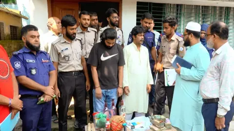 মাদক ও গুলিসহ বাবা-ছেলে আটক