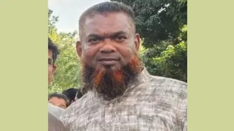 চাঁদা না পেয়ে ট্রাকচালককে পেটালেন শ্রমিকদল নেতা