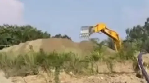 সীতাকুণ্ড উপকূলে বেপরোয়া বালুদস্যুতা